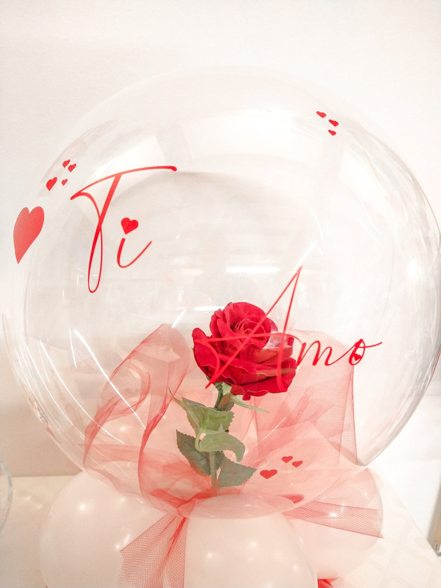 Centrotavola di Palloncini/ trasparente con fiori all'interno/ personalizzabile.